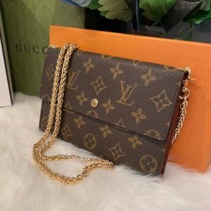 Louis Vuitton Pochette Passporte Trifold Wallet On Chain | CA0928. 7.5”Wx5”H.